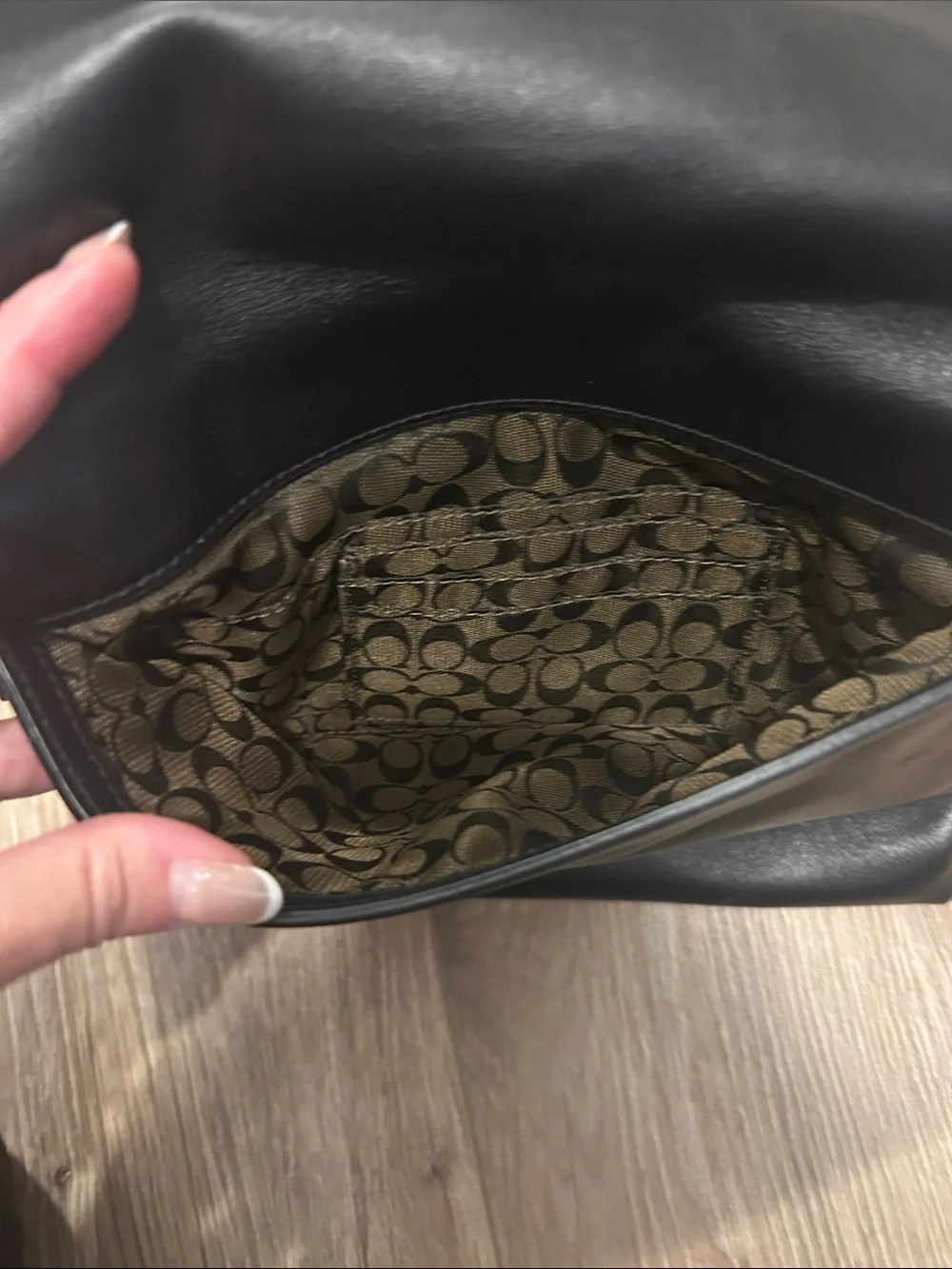 Coach Black Leather Fold-Over Crossbody with Gold Hardware